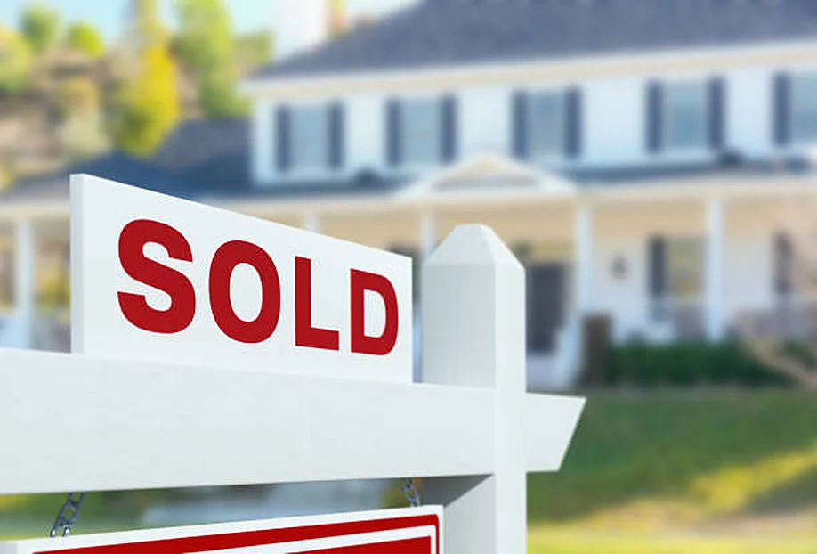 Sold sign in front of a home