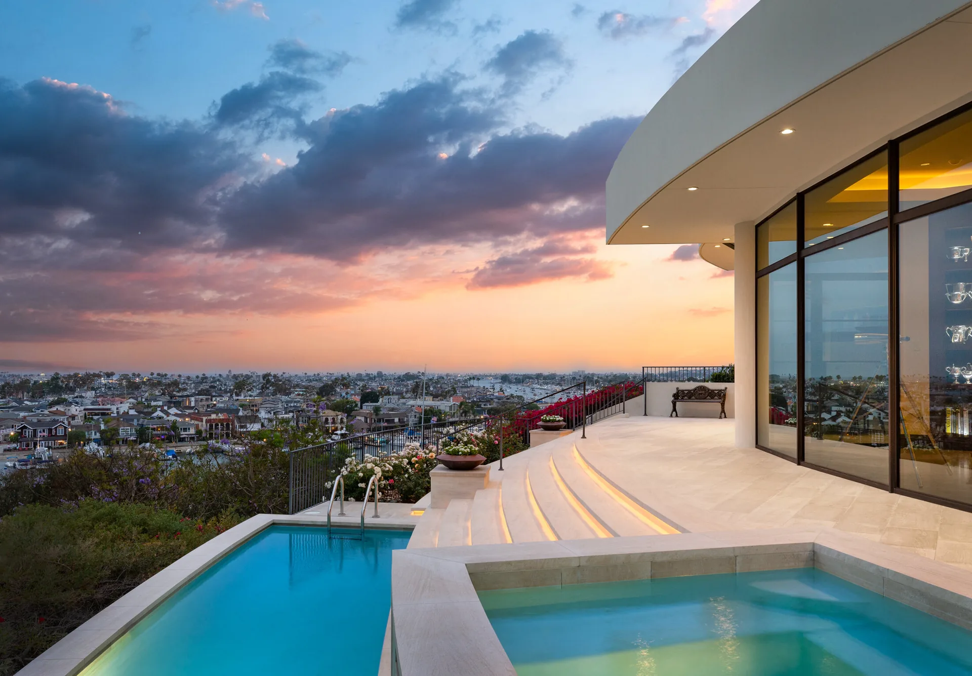 Orange County estate pool terrace at sunset