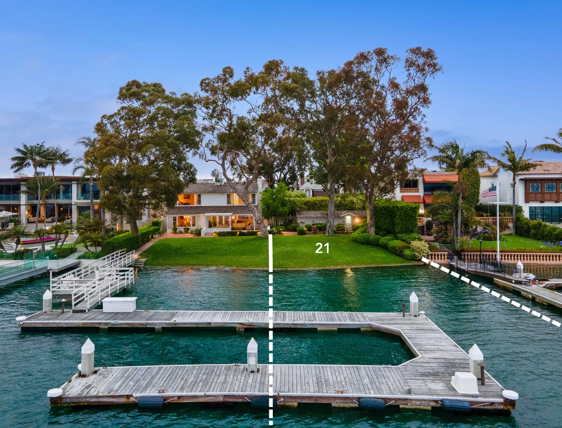 Bayfront estate at dusk on Newport Harbor